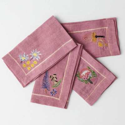 Bush Australian flowers embroidered on blush coloured napkins