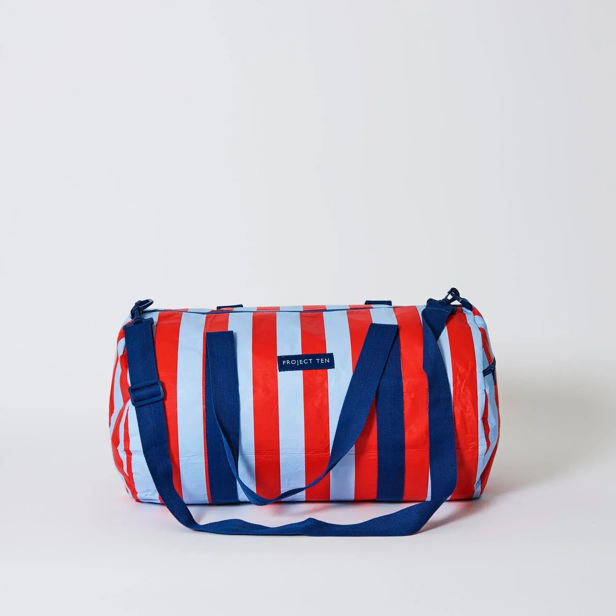 ProjectTen_BarrelBag_RedBlueStripe1_jpg.webp